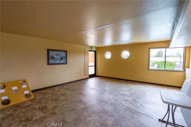 a living room with furniture and window