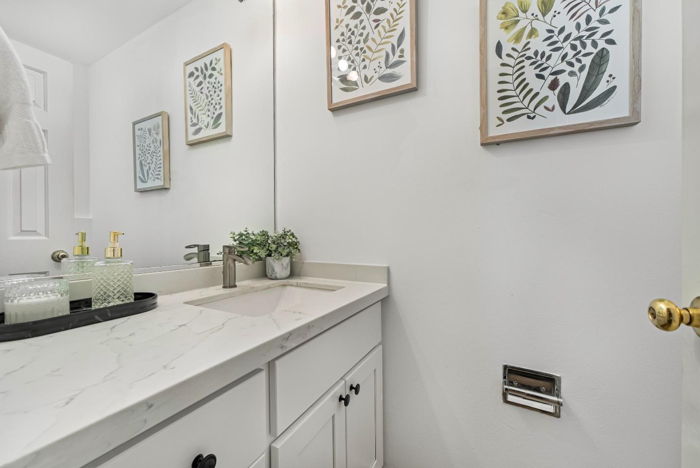 7130 Rainbow Drive, Unit 2 San Jose, CA 95129 - Photo 19 of 35 a bathroom with a sink and a mirror