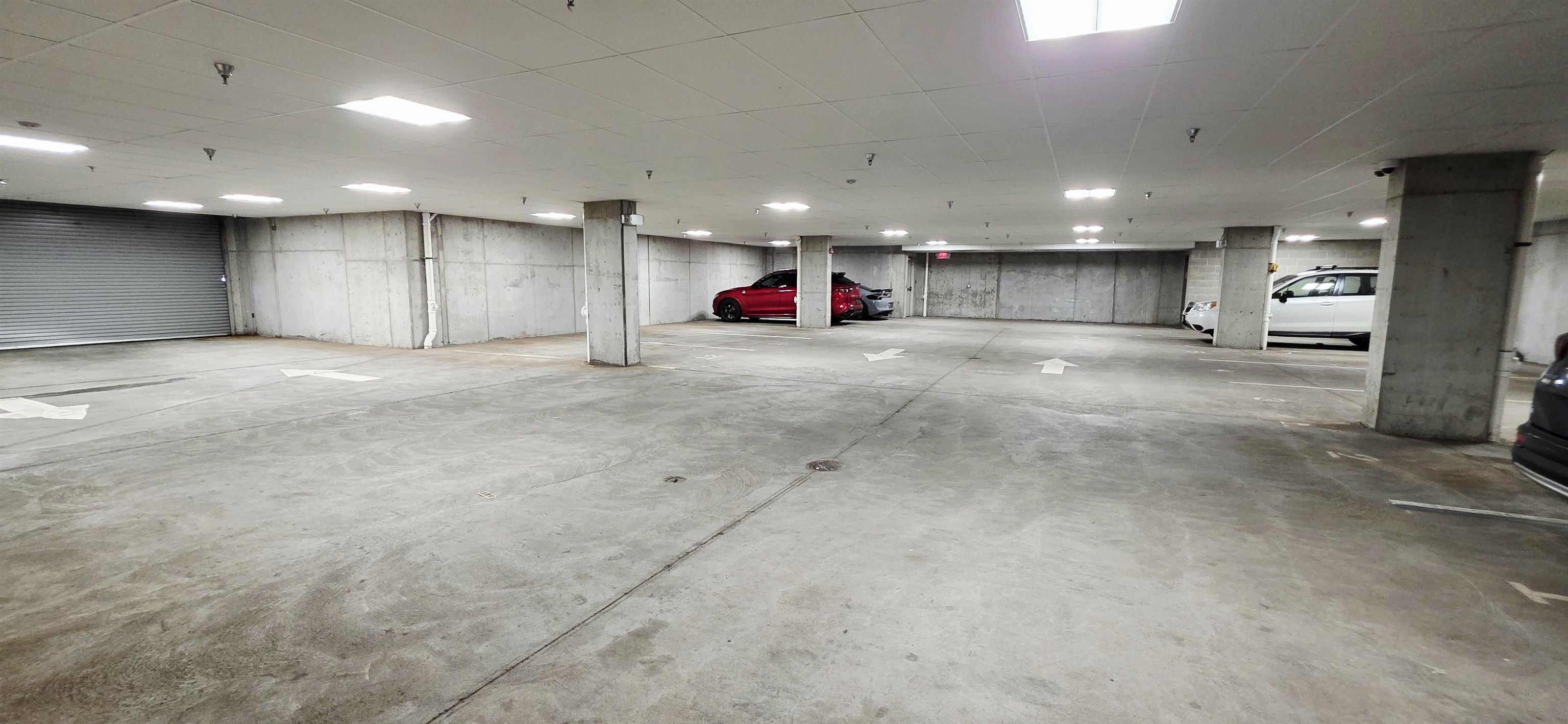 235 Ridge Road, Unit 3C North Arlington, NJ 07031 - Photo 13 of 13 an empty room with kitchen and a refrigerator
