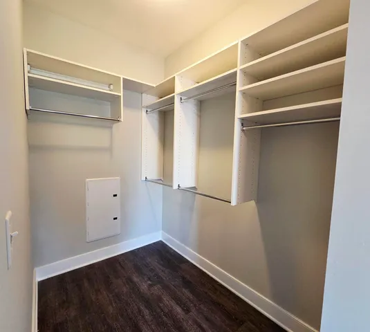a view of an empty walk in closet