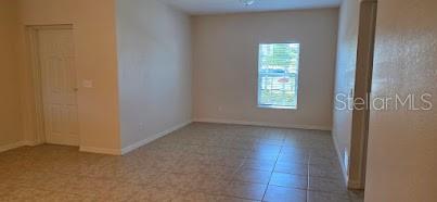 26172 Explorer Road, Unit 2 Punta Gorda, FL 33983 - Photo 5 of 10 an empty room that has a window in it