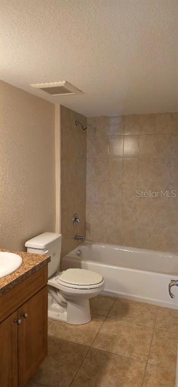 26172 Explorer Road, Unit 2 Punta Gorda, FL 33983 - Photo 10 of 10 a bathroom with a granite countertop sink toilet and shower