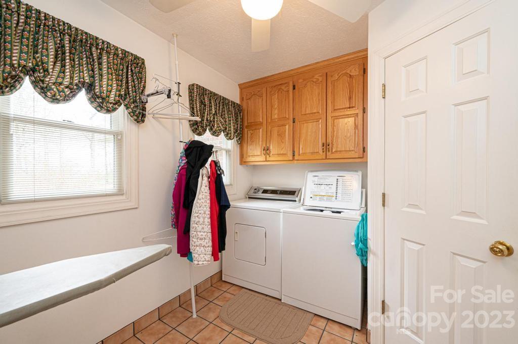 3808 Grace Chapel Road Granite Falls, NC 28630 - Photo 18 of 48 a utility room with dryer and washer