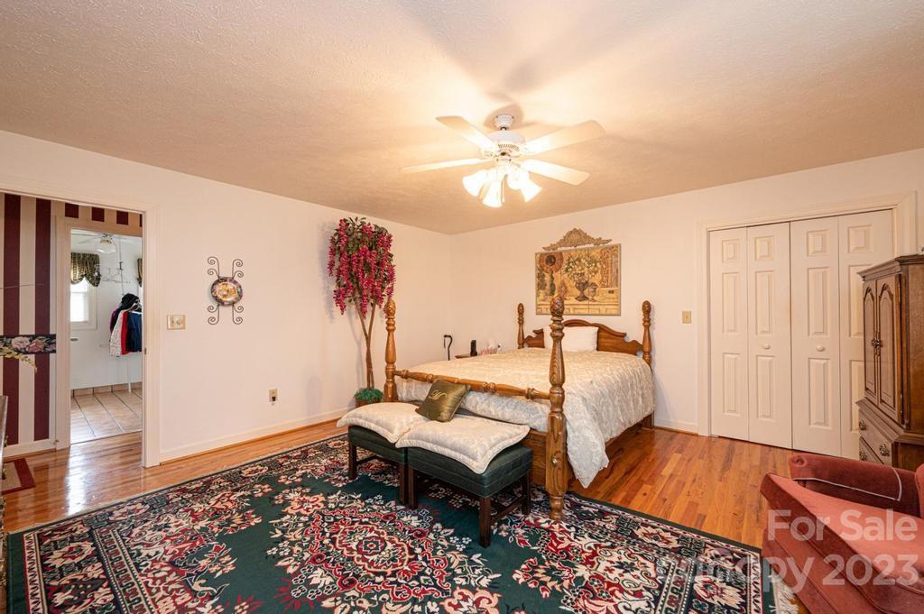 3808 Grace Chapel Road Granite Falls, NC 28630 - Photo 20 of 48 a living room with furniture and wooden floor