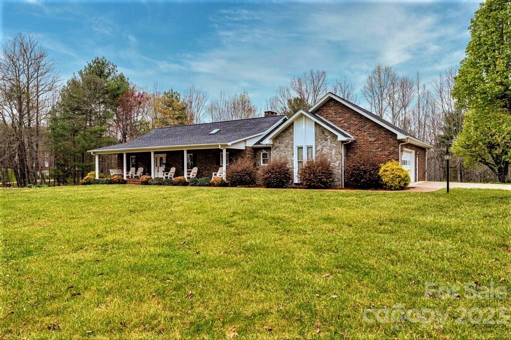 3808 Grace Chapel Road Granite Falls, NC 28630 - Photo 2 of 48 a front view of house with yard and green space