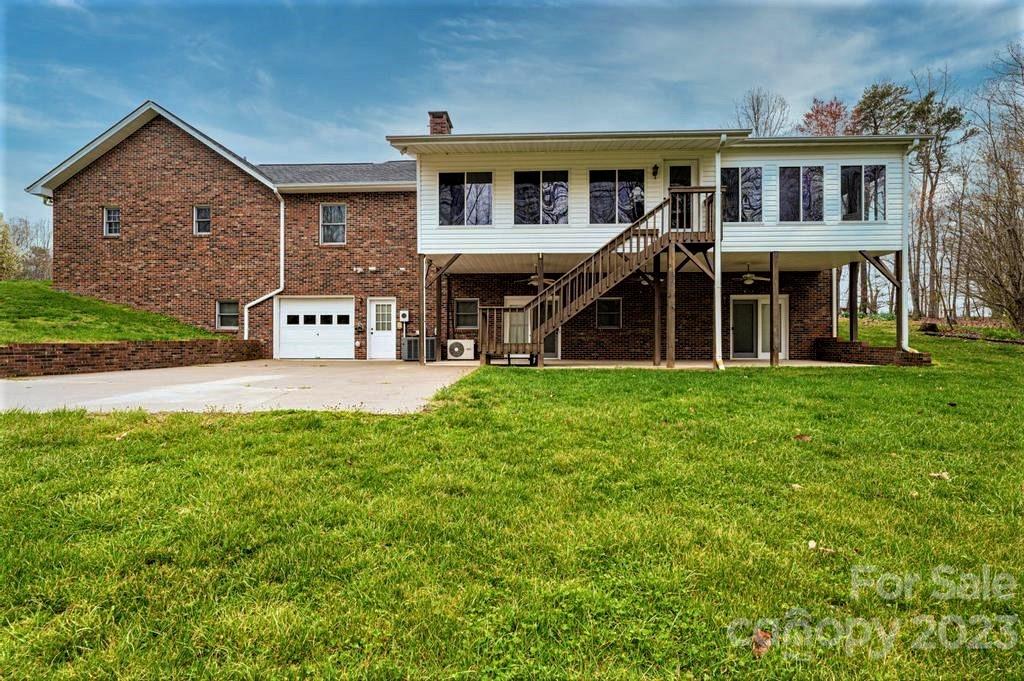 3808 Grace Chapel Road Granite Falls, NC 28630 - Photo 38 of 48 a front view of a house with garden