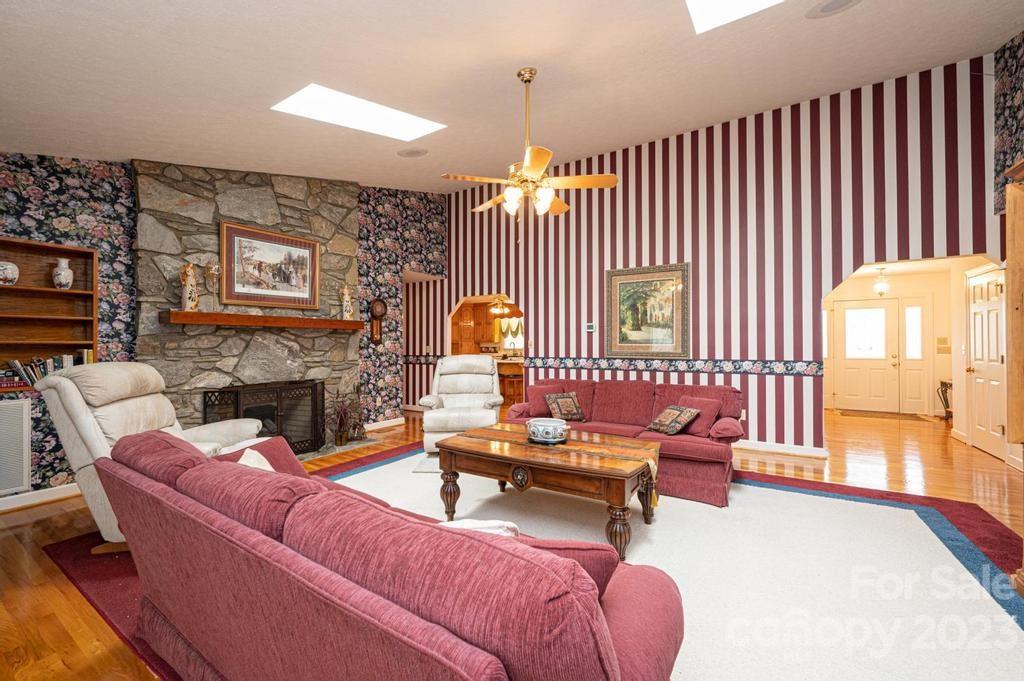 3808 Grace Chapel Road Granite Falls, NC 28630 - Photo 9 of 48 a living room with furniture and a fireplace