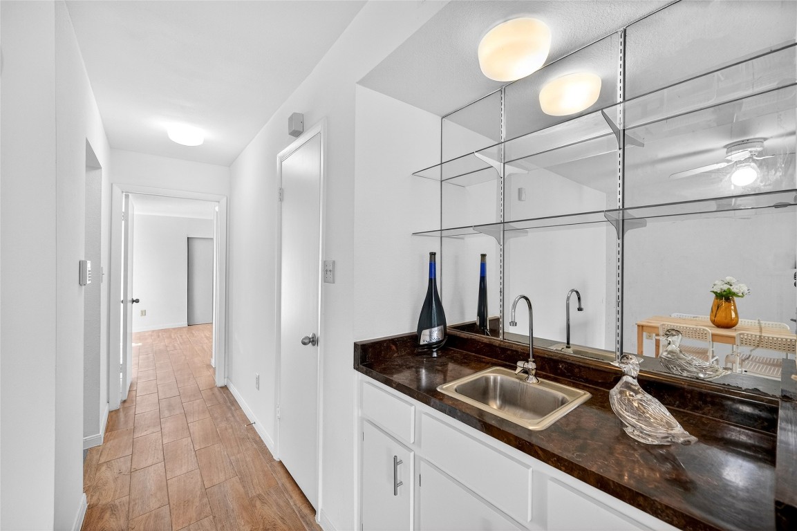 5000 Milwee Street, Unit 61 Houston, TX 77092 - Photo 15 of 42 a bathroom with a double vanity sink and a mirror