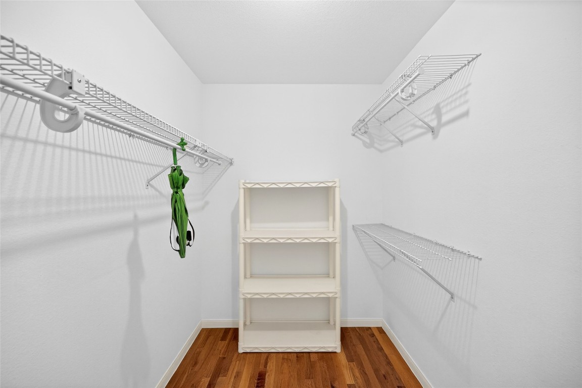 5000 Milwee Street, Unit 61 Houston, TX 77092 - Photo 30 of 42 a view of walk in closet with empty racks