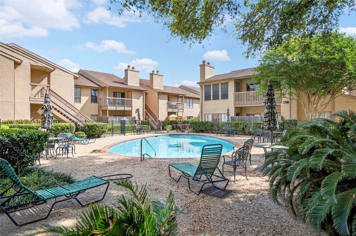 5000 Milwee Street, Unit 61 Houston, TX 77092 - Photo 6 of 42 a view of a patio with table and chairs and potted plants