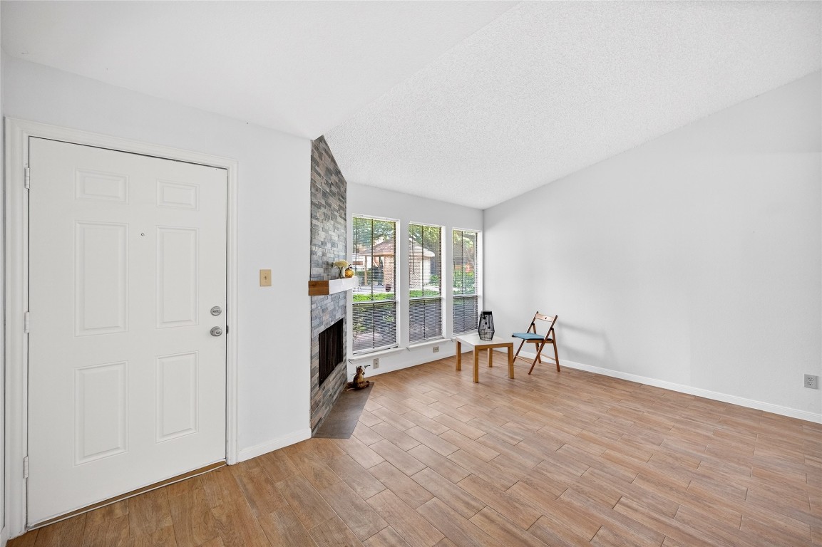 5000 Milwee Street, Unit 61 Houston, TX 77092 - Photo 8 of 42 a view of a livingroom with furniture and a window