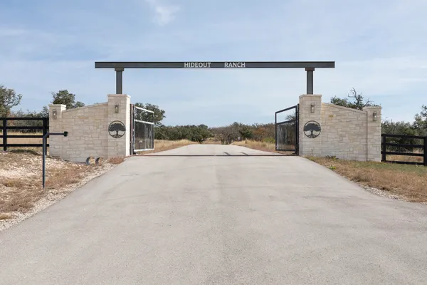 a big room with a bed and chair