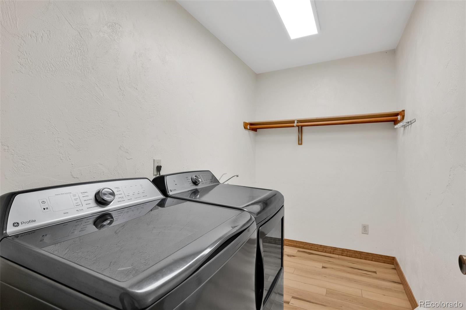 820 Schulze Ranch Road Westcliffe, CO 81252 - Photo 20 of 39 a utility room with dryer and washer
