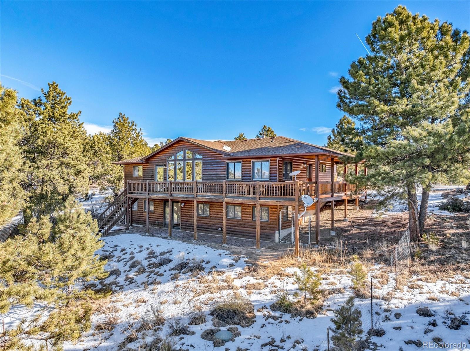 820 Schulze Ranch Road Westcliffe, CO 81252 - Photo 2 of 39 a view of a house with a yard