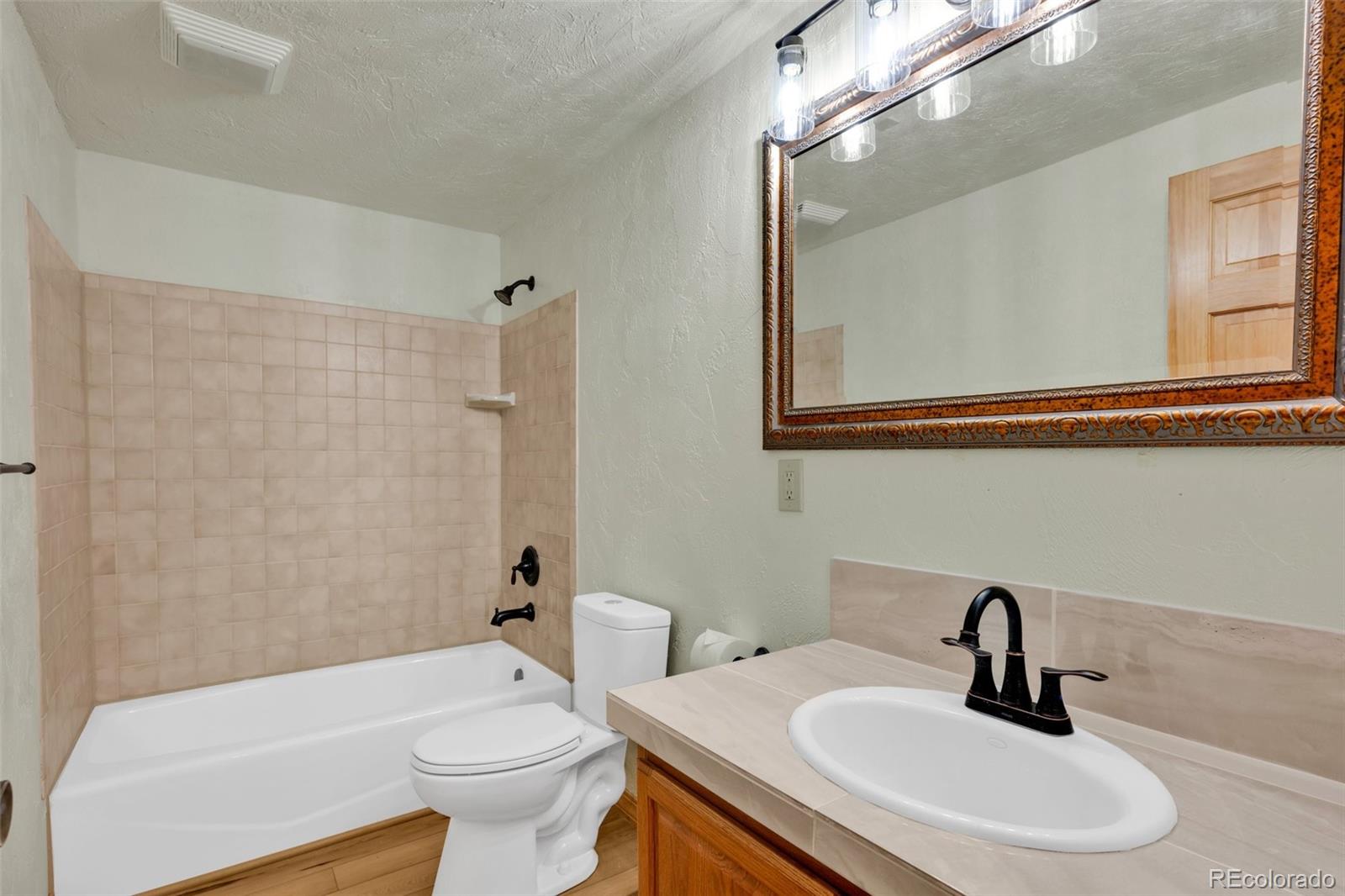 820 Schulze Ranch Road Westcliffe, CO 81252 - Photo 27 of 39 a bathroom with a sink a toilet and shower