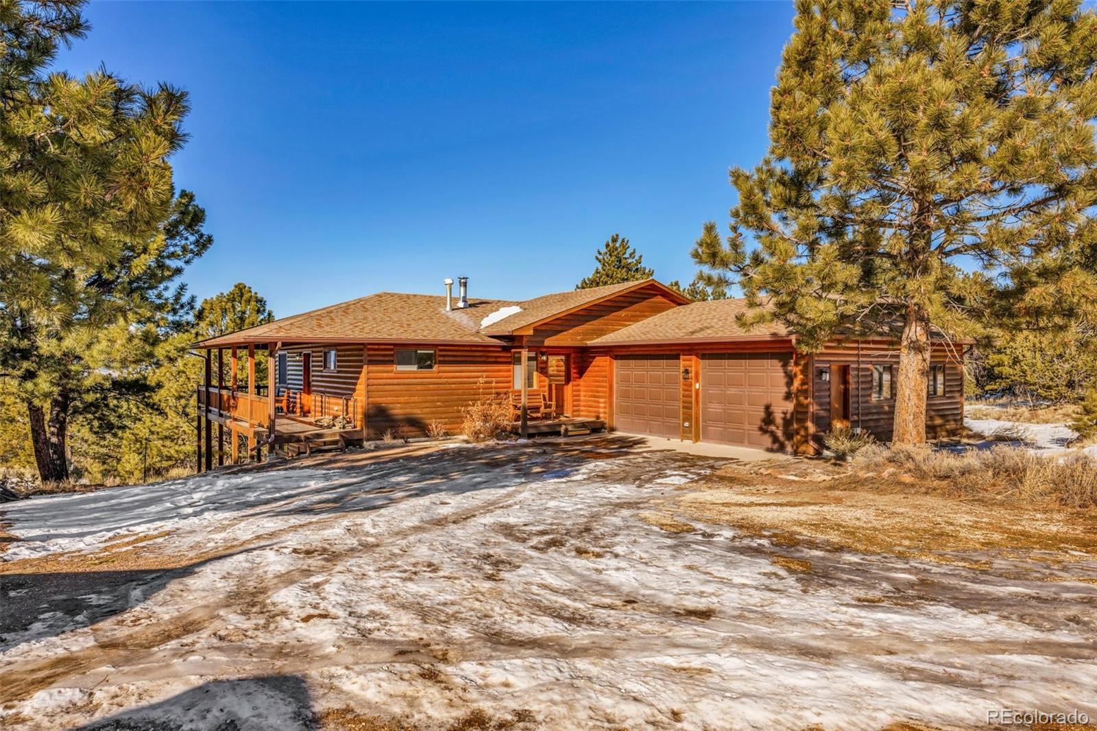 820 Schulze Ranch Road Westcliffe, CO 81252 - Photo 28 of 39 a front view of a house with a yard