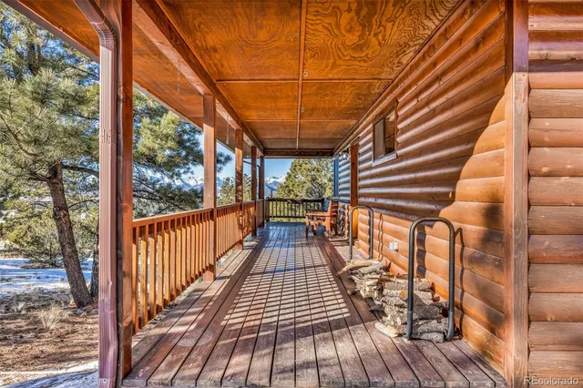 a view of balcony with wooden floor