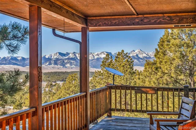 a view of a balcony with wooden floor