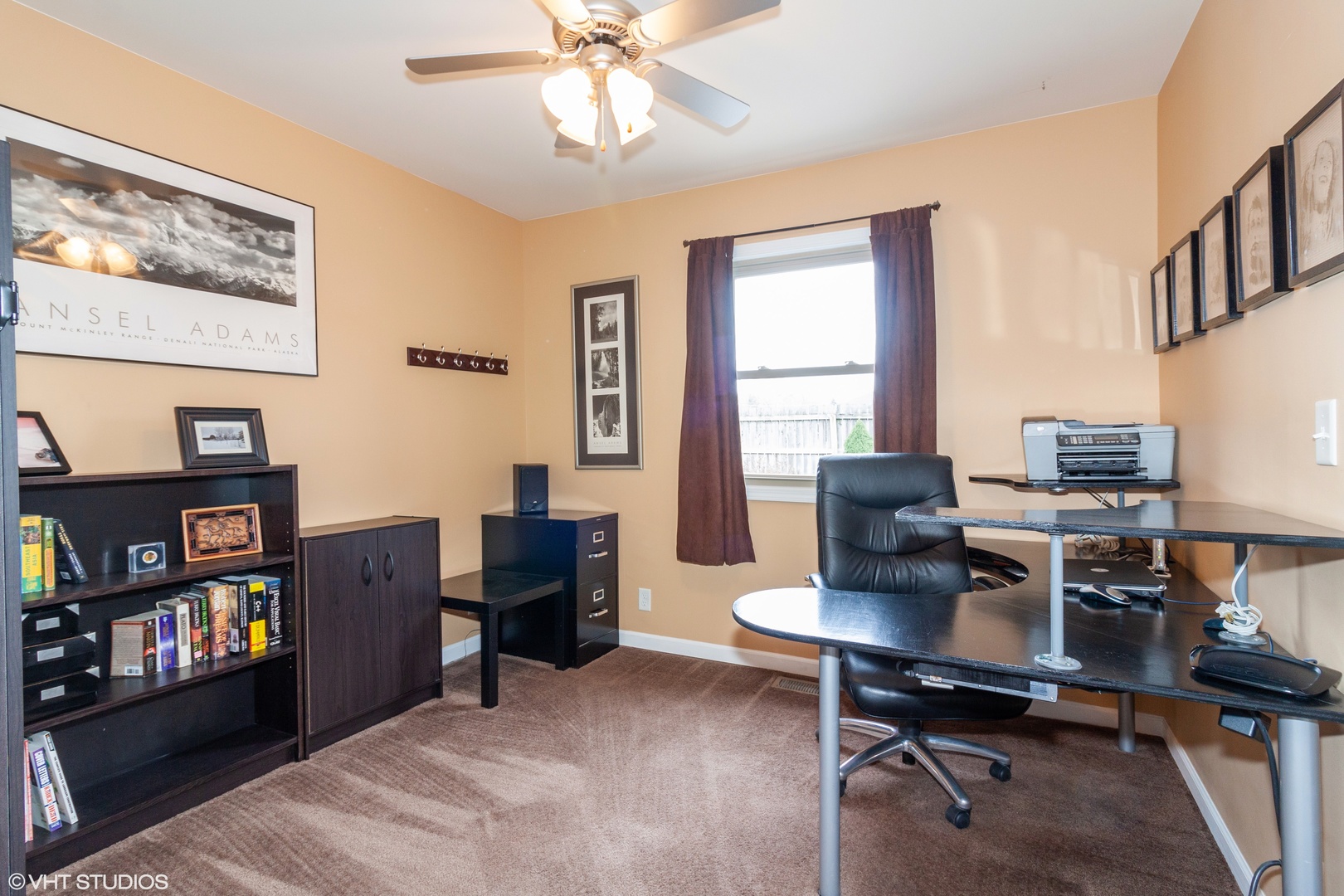 104 South Pinecrest Road Bolingbrook, IL 60440 - Photo 8 of 12 a view of a workspace with furniture and a window