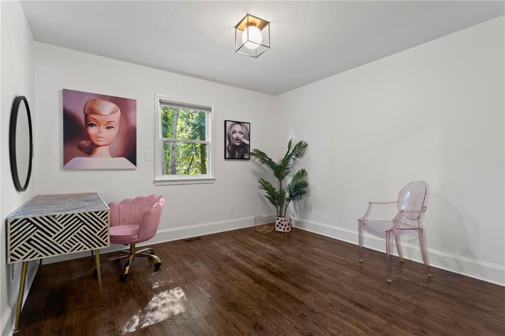 1788 Moores Mill Road Northwest Atlanta, GA 30318 - Photo 13 of 25 a living room with furniture and a window