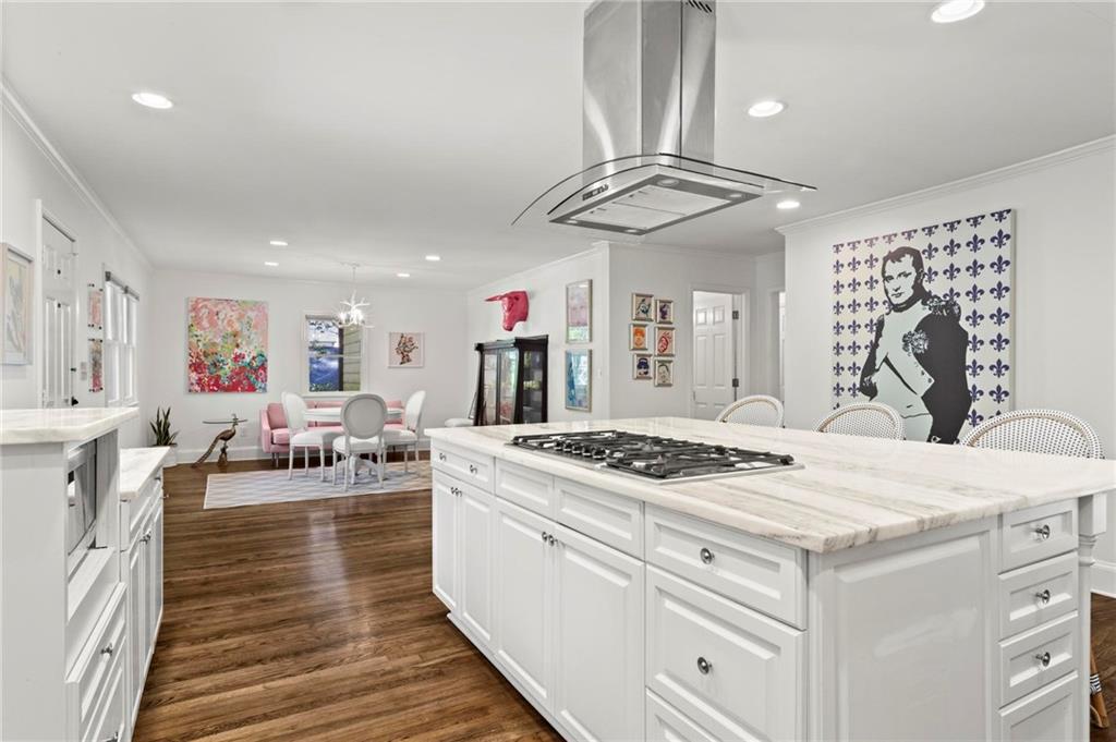 1788 Moores Mill Road Northwest Atlanta, GA 30318 - Photo 5 of 25 a kitchen that has a lot of cabinets in it