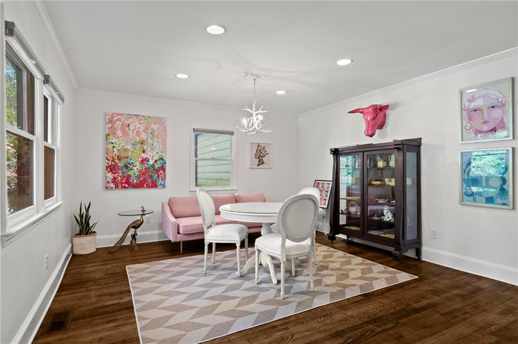 1788 Moores Mill Road Northwest Atlanta, GA 30318 - Photo 10 of 25 a living room with furniture dining table and wooden floor