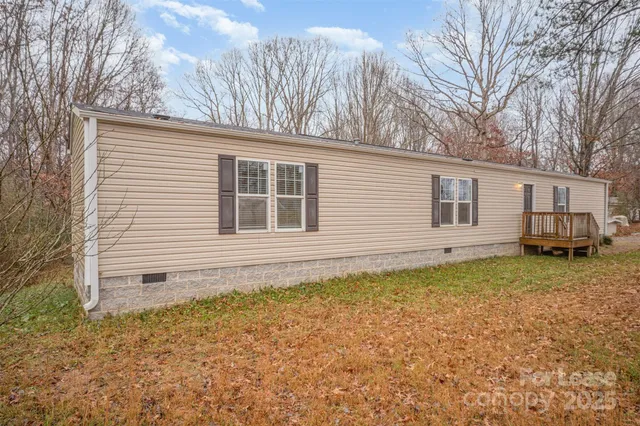 a house with trees in the background