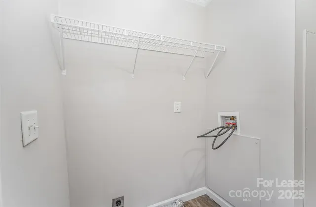 a view of small space with racks on the wall