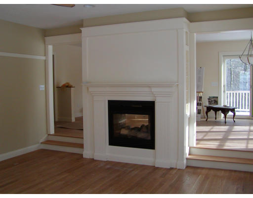 60 Oxford Road Charlton, MA 01507 - Photo 2 of 7 a living room with furniture and a fireplace