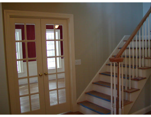 60 Oxford Road Charlton, MA 01507 - Photo 3 of 7 a view of staircase with wooden floor and windows