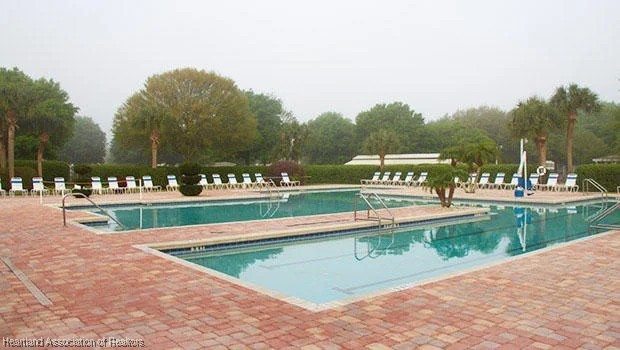 3312 Beartooth Pass Sebring, FL 33872 - Photo 33 of 39 a view of swimming pool and lake view