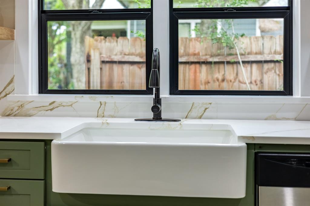 1014 Bolivar Street Denton, TX 76201 - Photo 17 of 36 a sink with a window