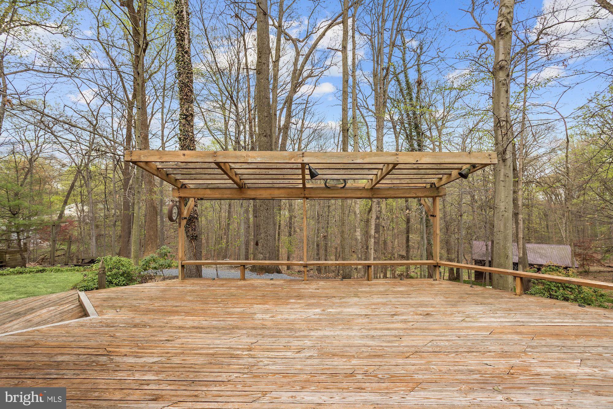 4628 Roundhill Road Ellicott City, MD 21043 - Photo 27 of 34 Expansive Deck & Pergola