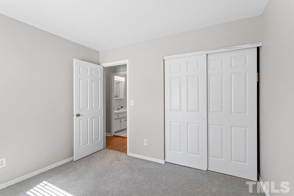 3304 Blue Ridge Road Raleigh, NC 27612 - Photo 19 of 34 an empty room with closet area