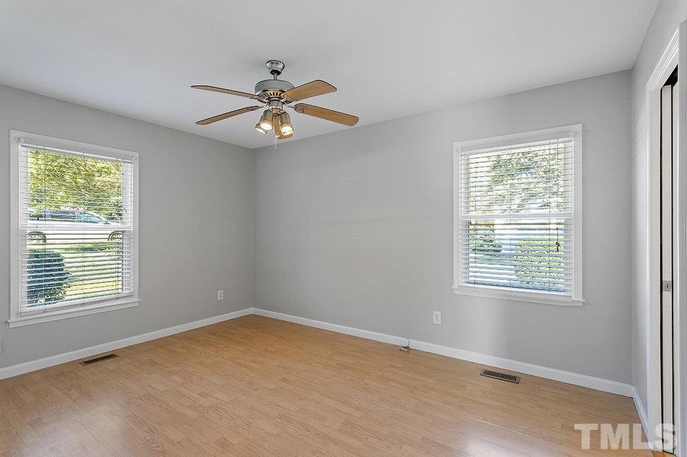 3304 Blue Ridge Road Raleigh, NC 27612 - Photo 24 of 34 a view of an empty room with a window