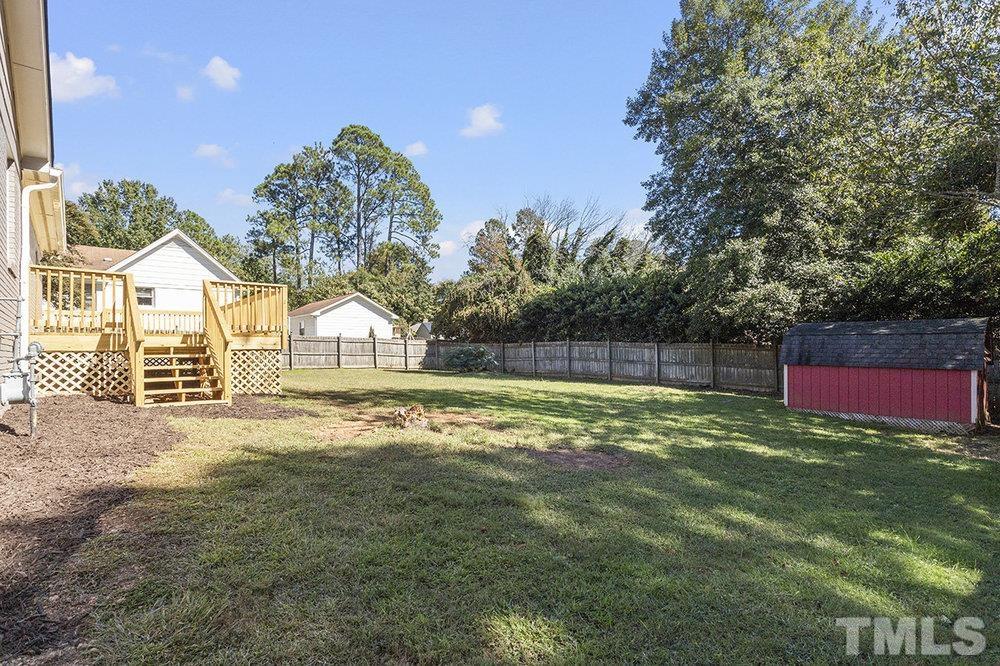 3304 Blue Ridge Road Raleigh, NC 27612 - Photo 30 of 34 a view of swimming pool of a house with a yard