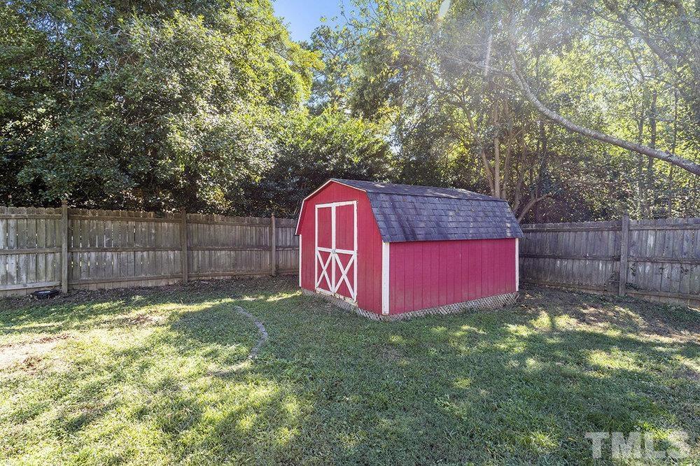 3304 Blue Ridge Road Raleigh, NC 27612 - Photo 31 of 34 a view of backyard with tree