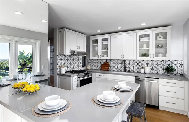 a bathroom with a double vanity sink and mirror