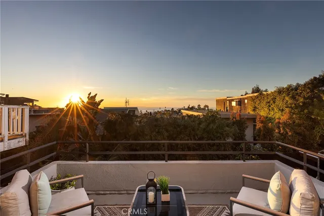 a view of a balcony with city view