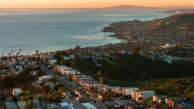 a view of an ocean and mountain