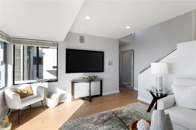 a view of a balcony with an outdoor seating