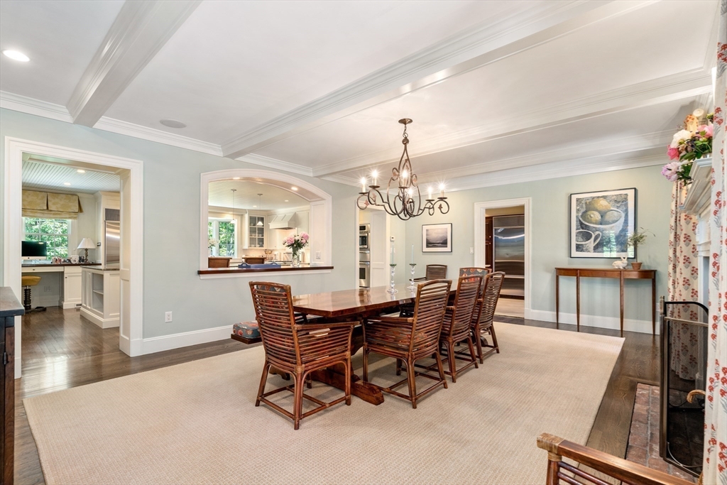 134 Dedham Street Dover, MA 02030 - Photo 15 of 42 a view of a dining room with furniture and chandelier