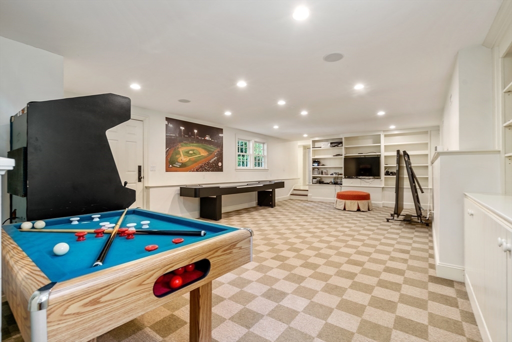 134 Dedham Street Dover, MA 02030 - Photo 27 of 42 a room with furniture pool table gym equipment mirrors and window