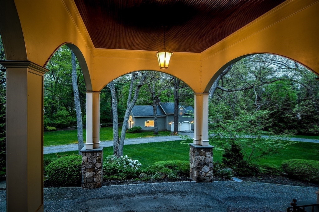 134 Dedham Street Dover, MA 02030 - Photo 32 of 42 a view of a big yard with potted plants