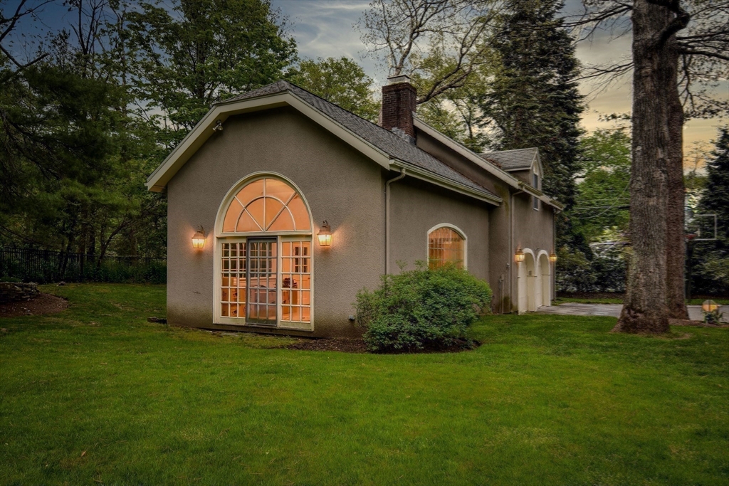 134 Dedham Street Dover, MA 02030 - Photo 33 of 42 a view of a back yard of the house