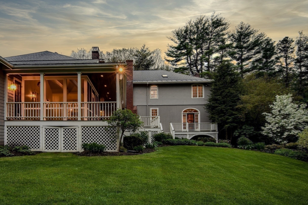 134 Dedham Street Dover, MA 02030 - Photo 38 of 42 a house view with a garden space