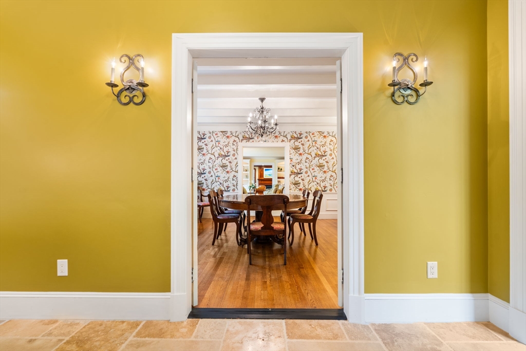 134 Dedham Street Dover, MA 02030 - Photo 4 of 42 a view of a dining room with a table and chairs