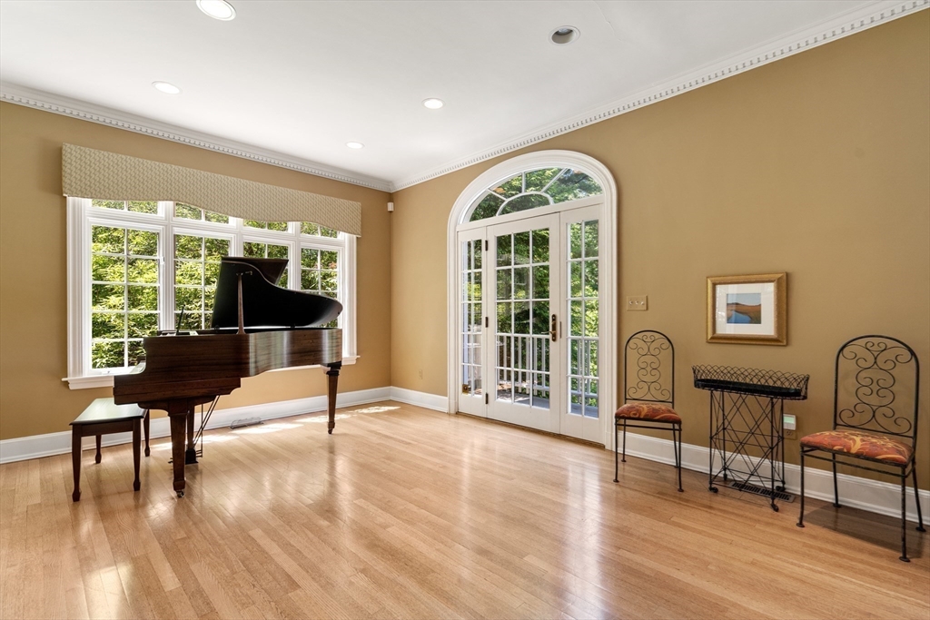 134 Dedham Street Dover, MA 02030 - Photo 10 of 42 a living room with furniture and a large window