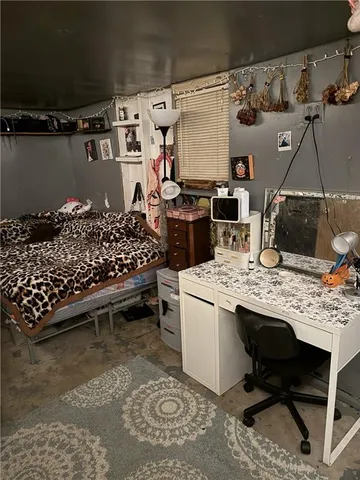 a view of a workspace with furniture