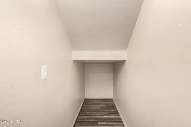 a bathroom with a sink toilet and a mirror